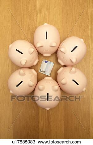piggy banks guarding money View Large Photo Image Stock Image - piggy banks guarding money. Fotosearch
