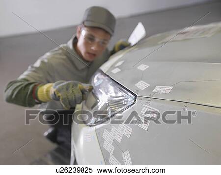 Plant Worker Inspecting Headlight On Car View Large Photo Image Stock Photography - Plant Worker Inspecting Headlight On Car. Fotosearch