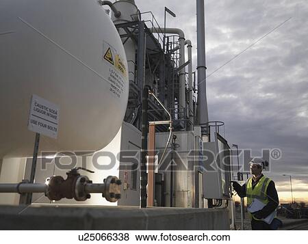 Port Worker At Control Panel View Large Photo Image Stock Photo - Port Worker At Control Panel. Fotosearch