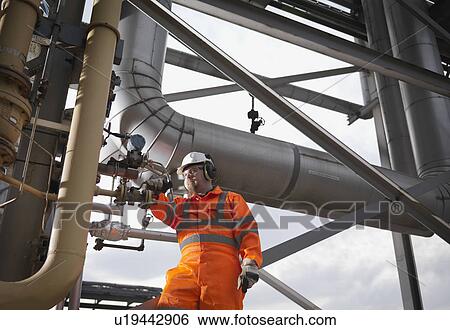 Stock Photograph - Port Worker In Power Station Environment. Fotosearch