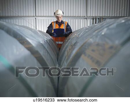 Port Worker Inspecting Cargo View Large Photo Image Stock Image - Port Worker Inspecting Cargo. Fotosearch