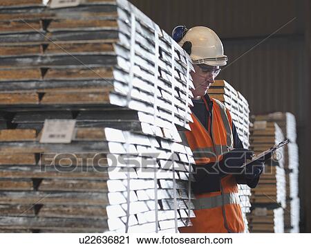 Port Worker Inspecting Cargo View Large Photo Image Stock Image - Port Worker Inspecting Cargo. Fotosearch
