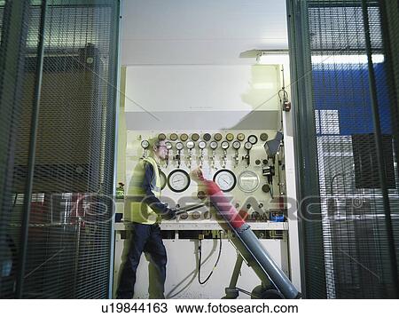 Port Worker Moving Gas Cylinder View Large Photo Image Stock Image - Port Worker Moving Gas Cylinder. Fotosearch