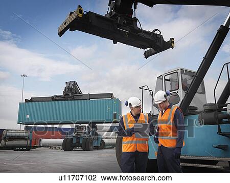 Port Worker & Shipping Containers View Large Photo Image Stock Image - Port Worker & Shipping Containers. Fotosearch