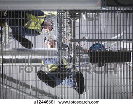 Stock Image - Port Worker Undergoing Training. Fotosearch