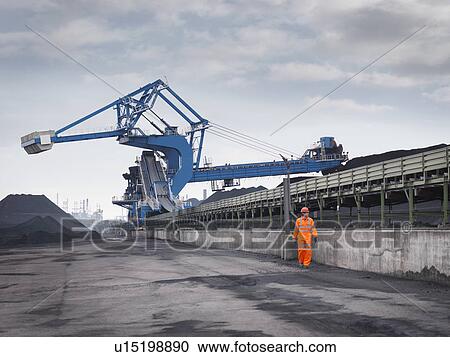 Port Worker With Heavy Machinery View Large Photo Image Stock Image - Port Worker With Heavy Machinery. Fotosearch