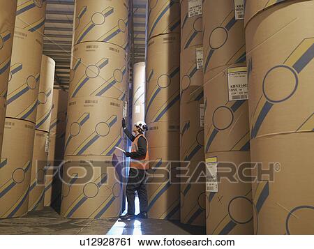 Port Worker With Products In Warehouse View Large Photo Image Stock Image - Port Worker With Products In Warehouse. Fotosearch