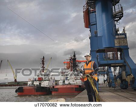Port Worker With Ships View Large Photo Image Stock Image - Port Worker With Ships. Fotosearch