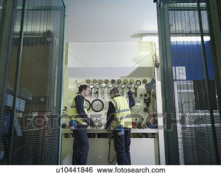 Port Workers At Control Panel View Large Photo Image Stock Photograph - Port Workers At Control Panel. Fotosearch