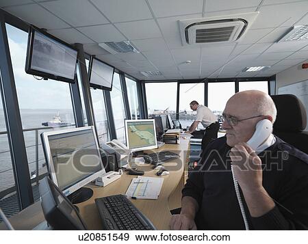 Port Workers In Control Tower View Large Photo Image Stock Photo - Port Workers In Control Tower. Fotosearch