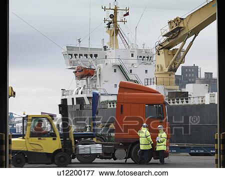 Stock Photo - Port Workers With Lorry & Ship. Fotosearch
