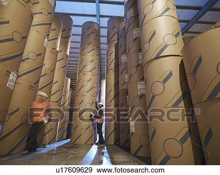 Port Workers With Products In Warehouse View Large Photo Image Stock Photo - Port Workers With Products In Warehouse. Fotosearch