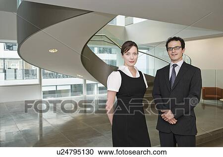 Stock Image - Portrait of a business couple. Fotosearch