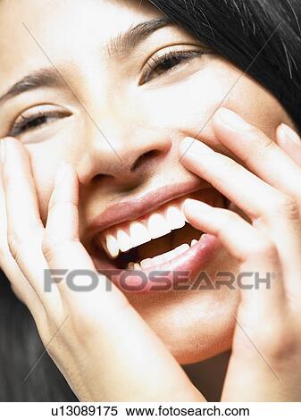 Stock Photography - Portrait of a woman, smiling. Fotosearch