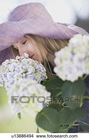 Portrait of a woman with flowers View Large Photo Image Picture - Portrait of a woman with flowers. Fotosearch
