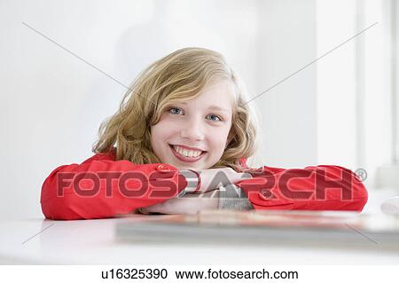 Stock Image - Portrait of an younger smiling woman. Fotosearch