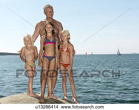 Picture - Portrait of grandfather and kids. Fotosearch