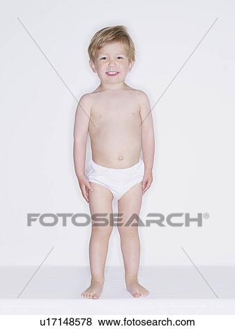 Stock Photo - Portrait of smiling toddler boy. Fotosearch