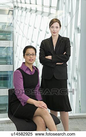 Portrait of two business women. View Large Photo Image Stock Photography - Portrait of two business women.. Fotosearch