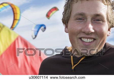 Picture - Portrait of young male smiling. Fotosearch