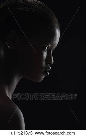Profile of woman on black background View Large Photo Image Stock Image - Profile of woman on black background. Fotosearch