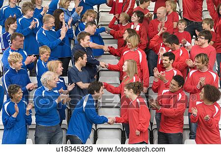 Rival fans at football match View Large Photo Image Stock Photo - Rival fans at football match. Fotosearch