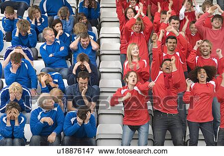 Stock Photo - Rival fans at football match. Fotosearch