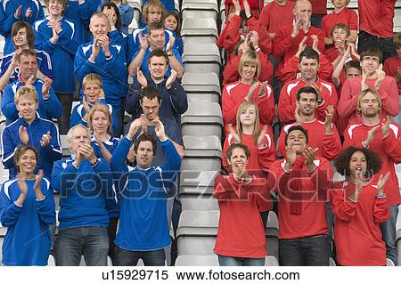 Stock Photography - Rival fans at football match. Fotosearch