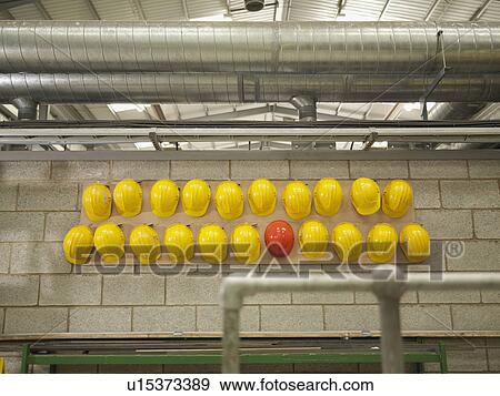 Rows Of Yellow And Red Hard Hats View Large Photo Image Stock Photo - Rows Of Yellow And Red Hard Hats. Fotosearch