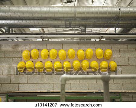 Rows Of Yellow Hard Hats View Large Photo Image Stock Photo - Rows Of Yellow Hard Hats. Fotosearch