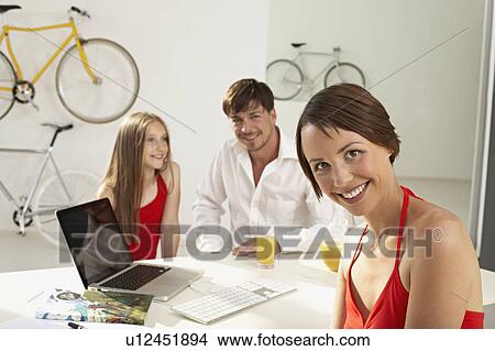 salesgirl with family in bikestore View Large Photo Image Picture - salesgirl with family in bikestore. Fotosearch