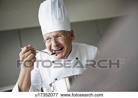 Stock Photo - Senior Chef Portait. Fotosearch
