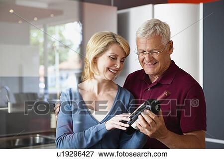 Senior Couple Choosing Wine View Large Photo Image Stock Photo - Senior Couple Choosing Wine. Fotosearch