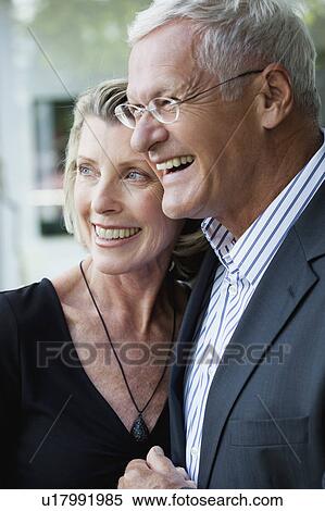 Stock Photography - Senior Couple Embracing. Fotosearch
