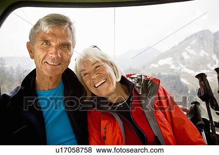 senior couple in mountain cable car View Large Photo Image Stock Photo - senior couple in mountain cable car. Fotosearch