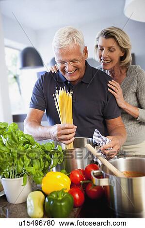 Senior Couple Preparing Spaghetti View Large Photo Image Stock Image - Senior Couple Preparing Spaghetti. Fotosearch