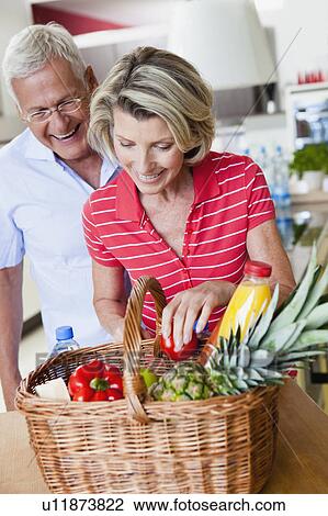Senior Couple with Shopping Basket View Large Photo Image Stock Image - Senior Couple with Shopping Basket. Fotosearch