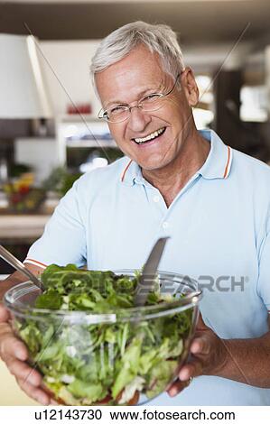 Senior Man Holding Salad View Large Photo Image Stock Image - Senior Man Holding Salad. Fotosearch
