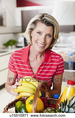 Senior Woman With Shopping Basket View Large Photo Image Stock Image - Senior Woman With Shopping Basket. Fotosearch