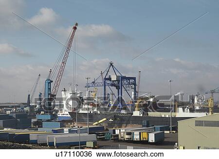 Ship Being Loaded At A Port View Large Photo Image Stock Photograph - Ship Being Loaded At A Port. Fotosearch
