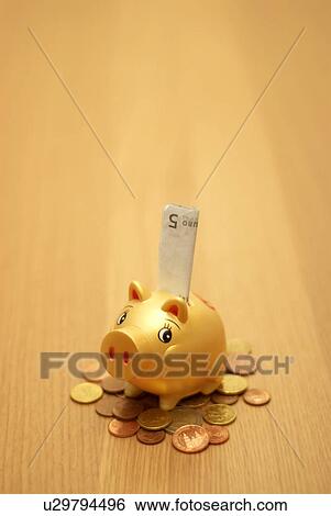 small piggy bank on money View Large Photo Image Stock Photograph - small piggy bank on money. Fotosearch
