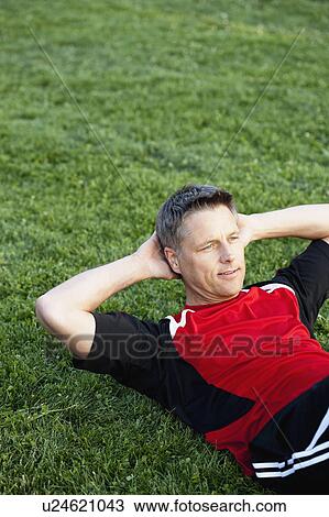 Soccer Player Doing Sit-Ups View Large Photo Image Stock Image - Soccer Player Doing Sit-Ups. Fotosearch
