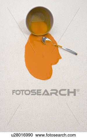 Stock Image - spilt bowl of soup. Fotosearch
