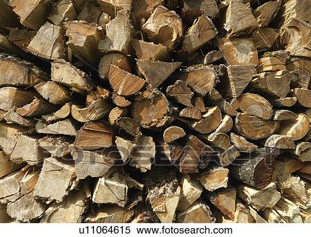 Stock Photography - Stack of wooden logs. Fotosearch