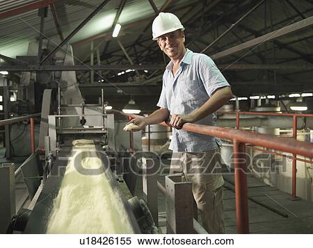 Stock Photography - Supervisor With Processed Sugar Cane. Fotosearch