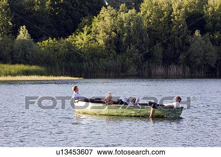 three businessmen relaxing in rowboat View Large Photo Image Stock Photo - three businessmen relaxing in rowboat. Fotosearch
