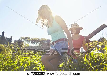 two girls walking into a field View Large Photo Image Stock Image - two girls walking into a field. Fotosearch