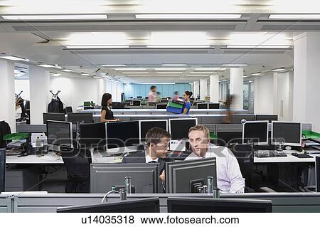 Two male colleagues discuss work View Large Photo Image Stock Photo - Two male colleagues discuss work. Fotosearch