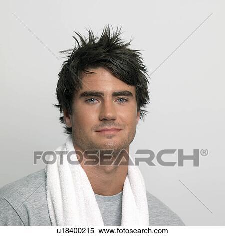 unshaved young man with towel View Large Photo Image Stock Photography - unshaved young man with towel. Fotosearch