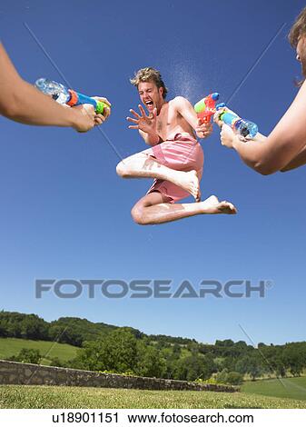 water fight View Large Photo Image Stock Image - water fight. Fotosearch